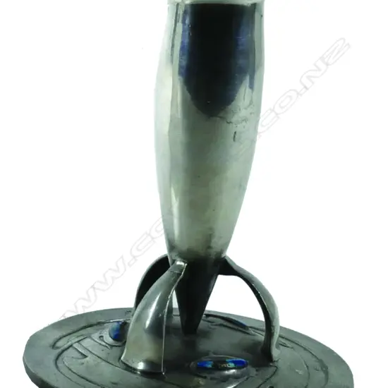 An Archibald Knox design English Pewter (Tudric) candlestick for Liberty