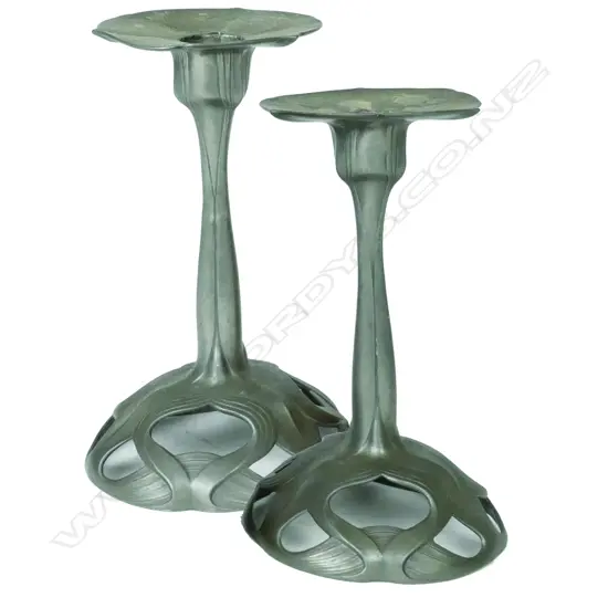 A pair of stylish German Orivit pewter Art Nouveau candlesticks. Height 180