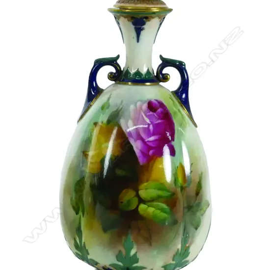 A Royal Worcester lidded urn vase