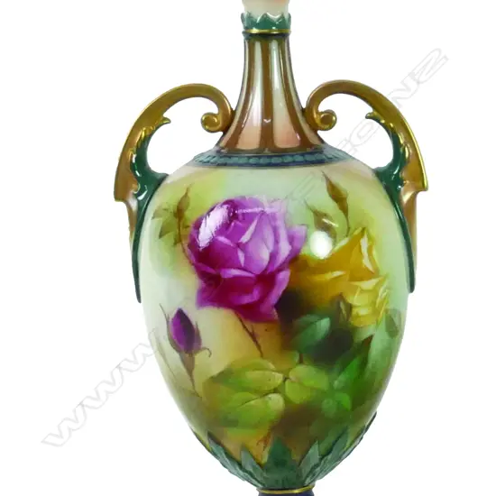 A Royal Worcester two-handled lidded urn vase. Hadley's shape 248