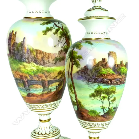 A pair of Royal Worcester baluster shaped urn vases