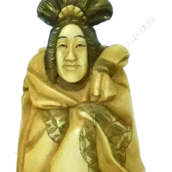 A carved ivory netsuke of the Japanese female deity Benten