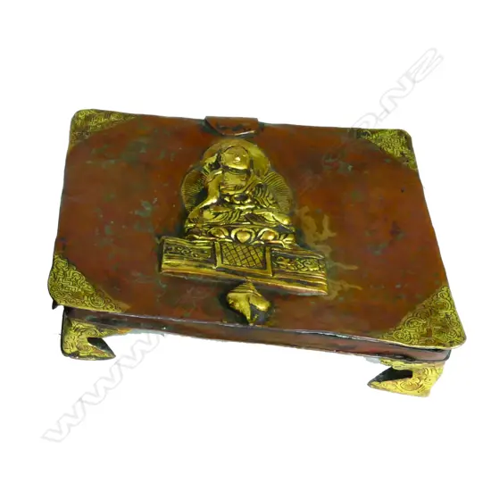 A gilded copper Tibetan sutra box