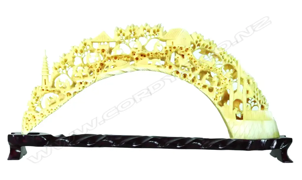 A large ornately carved ivory hippopotamus tusk Image 1++