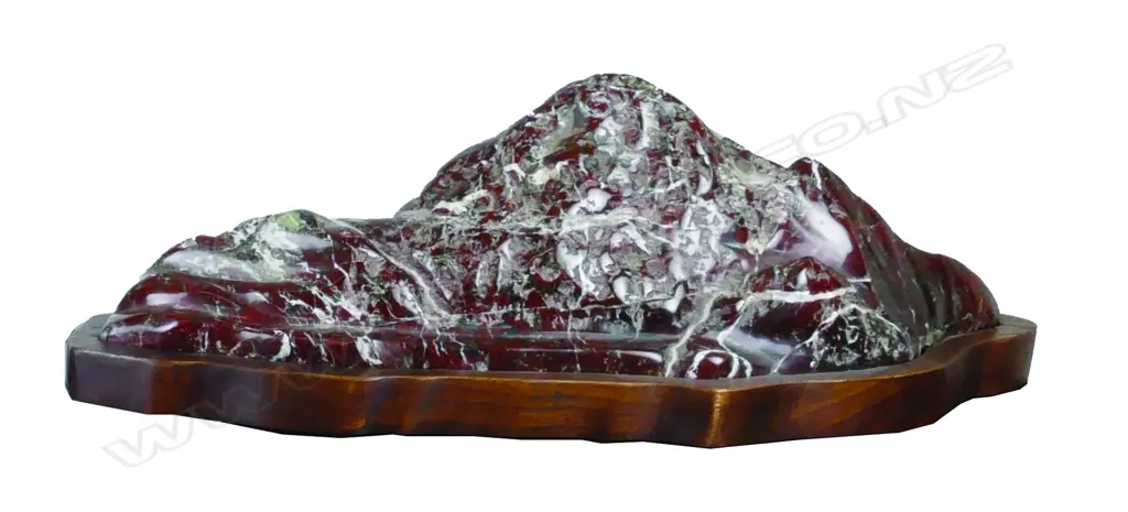 A scholar's rock on wooden plinth stand Image 1++