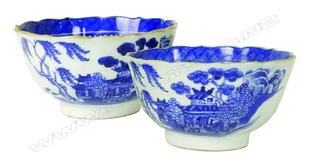A pair of 19thC Chinese blue and white willow pattern tea bowls Image 1++