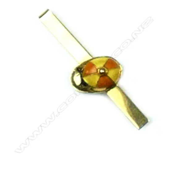 A 14ct gold and enamel jockey cap clip