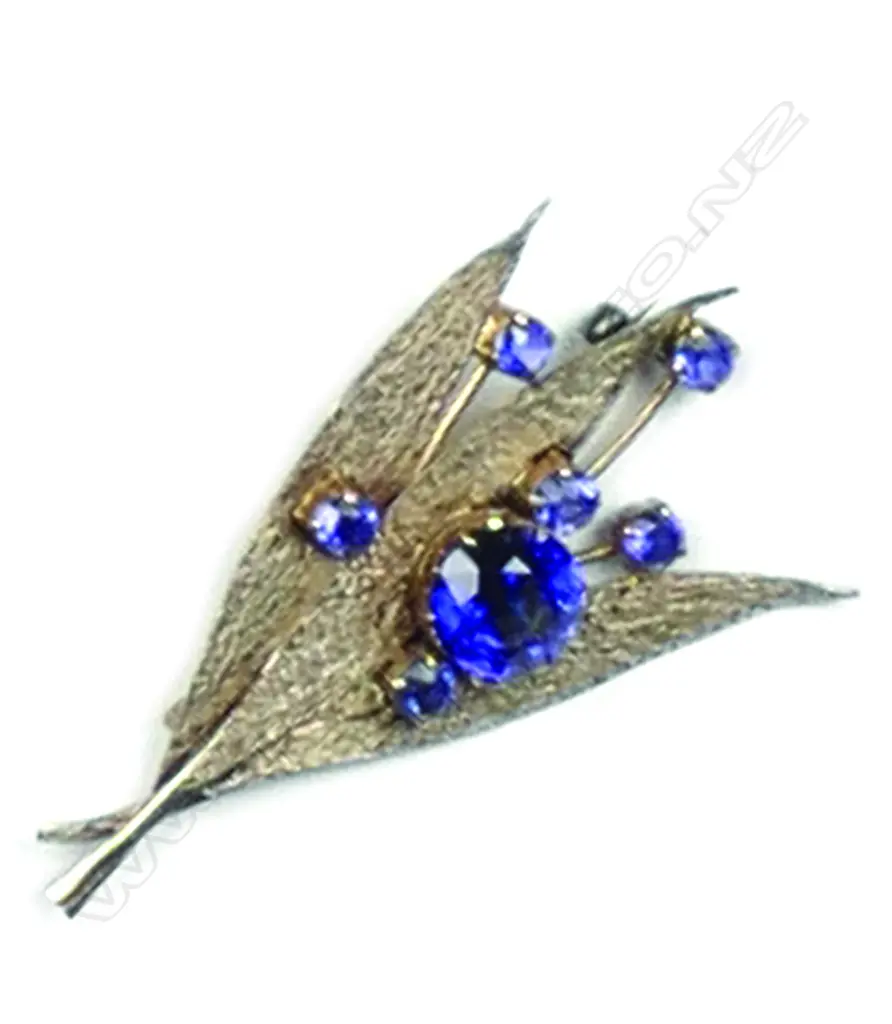 A vintage palladium and yellow gold floral flower and leaf brooch Image 1++