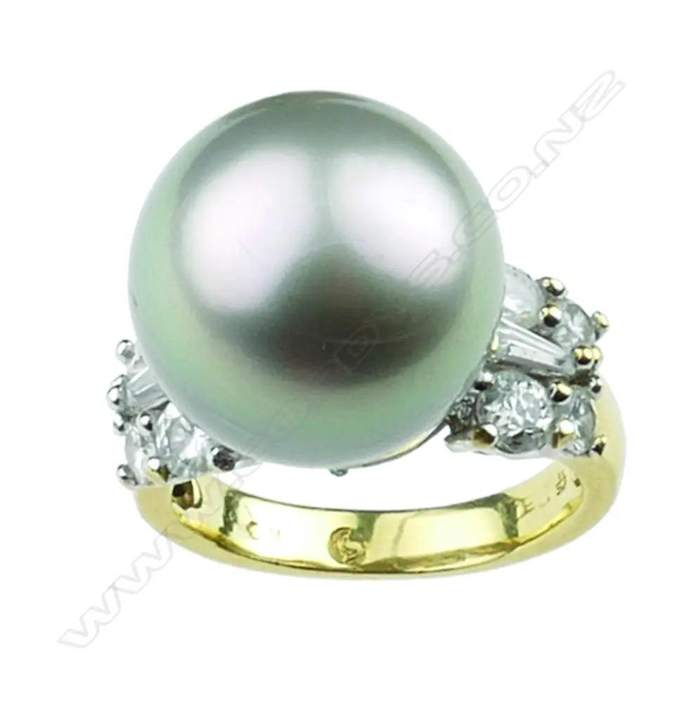 An 18ct black pearl and diamond ring Image 1++