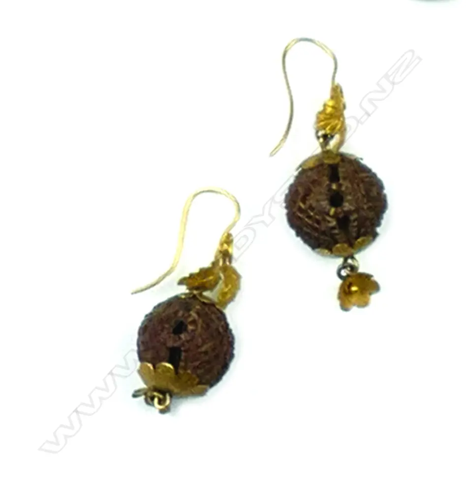 A pair of Victorian gilded gold and carved nut earrings Image 1++