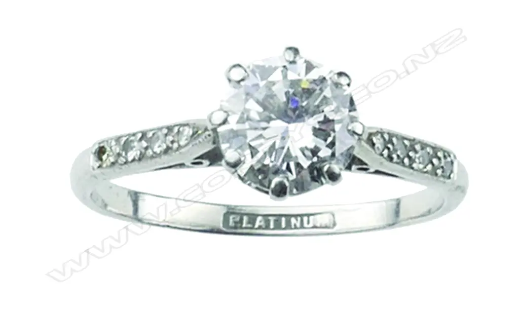 An estate platinum and diamond solitaire ring Image 1++