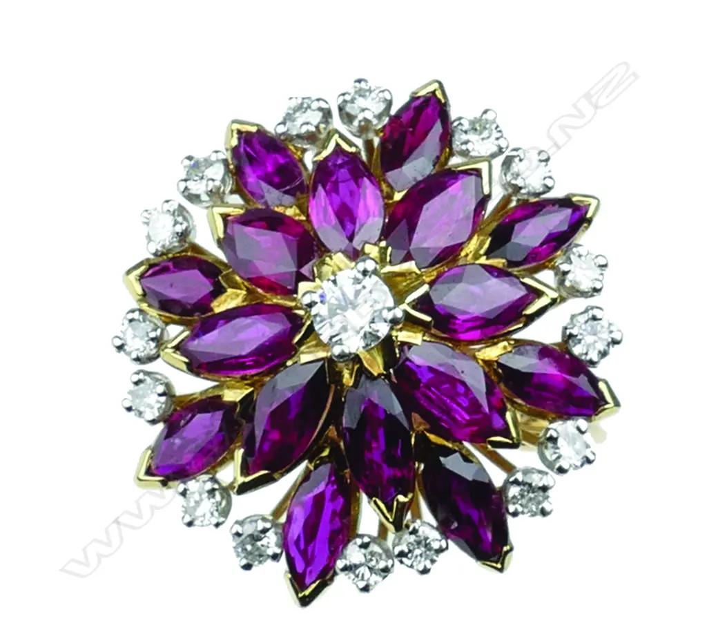 An impressive 18ct gold ruby and diamond princess ring Image 1++