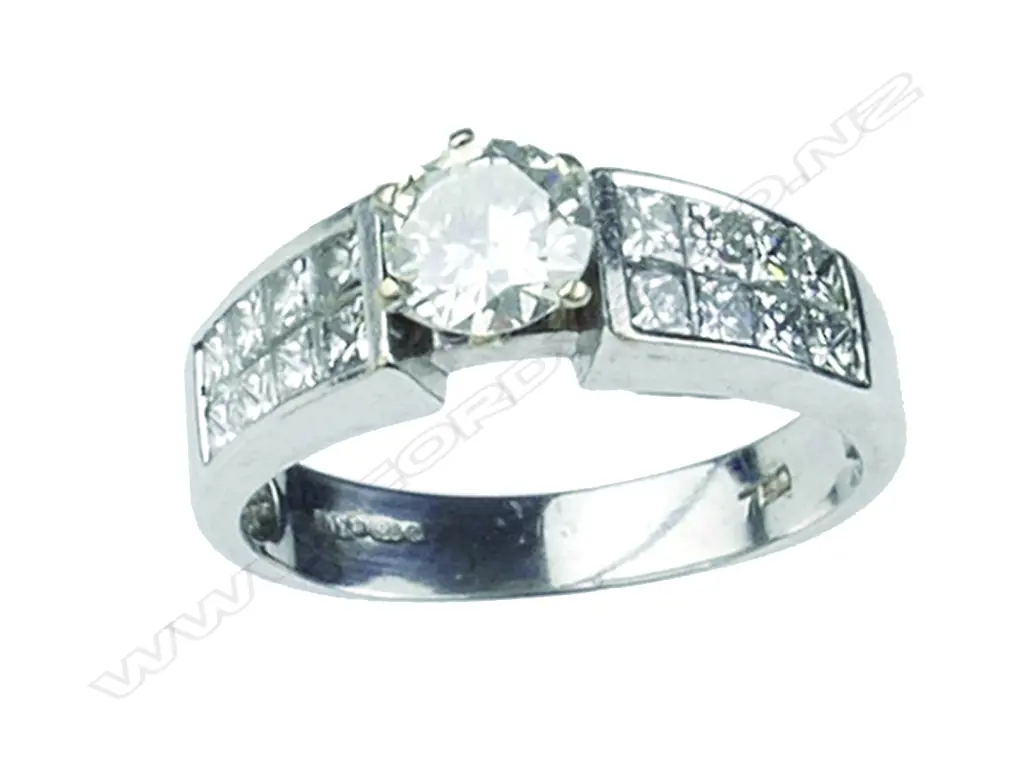An 18ct. white gold and diamond ring Image 1++