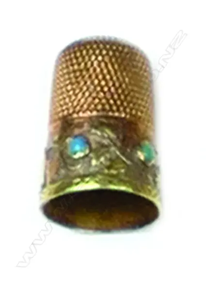 An antique 14ct. rose and yellow gold thimble Image 1++