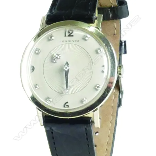 A c.1957 14ct. white gold Longines 13 diamond mens' wristwatch