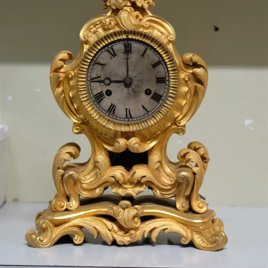A quality 19thC French Baroque Revival gilt ormolu mantel clock