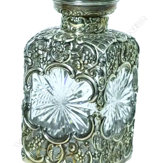 An impressive large Edwardian silver and cut crystal scent bottle