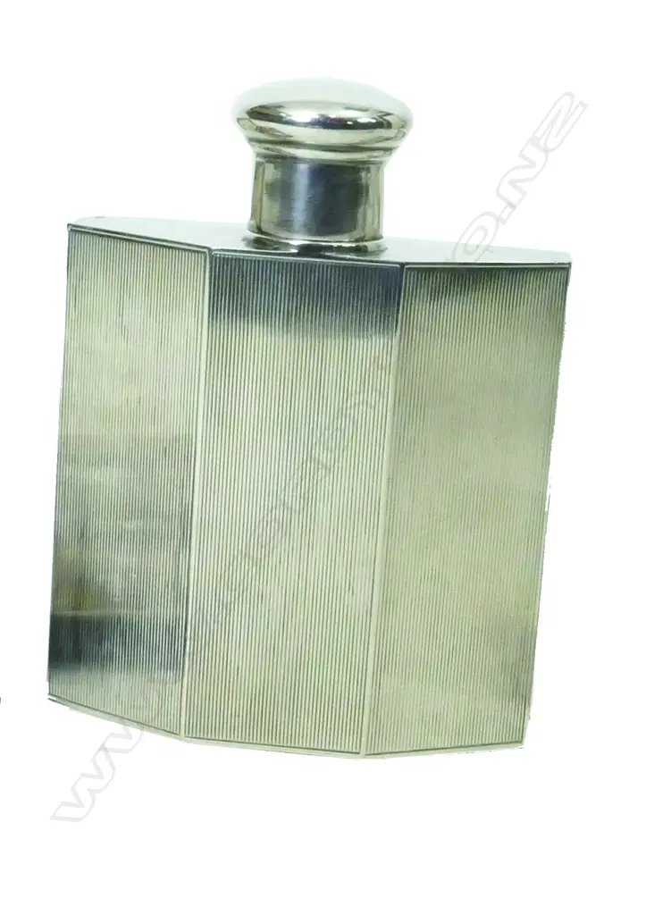 A sterling silver hip flask Image 1++