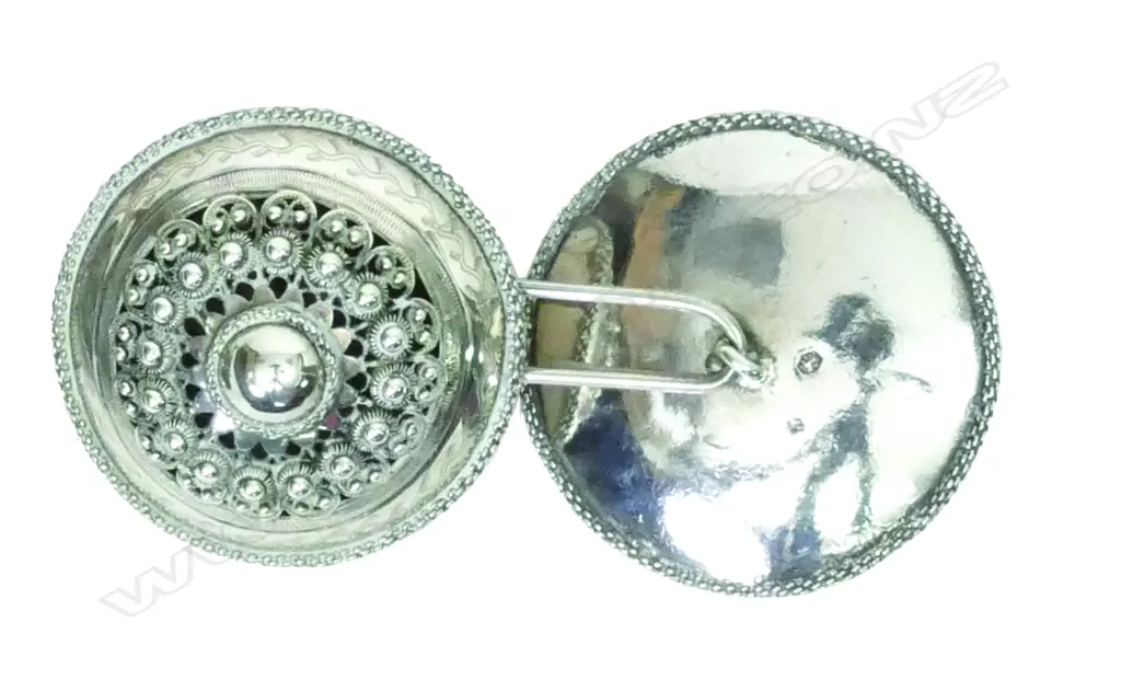 A pair of c.1900 Indo-Dutch silver decorative pillow ends Image 1++