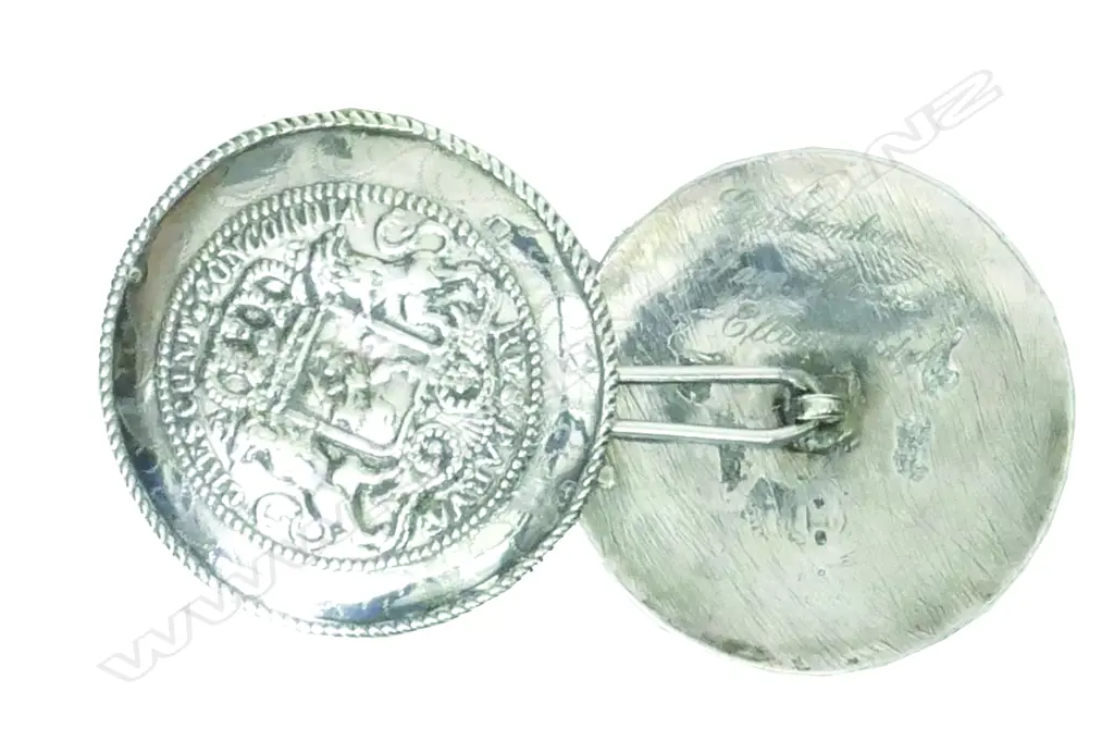 A pair of c.1900 Dutch silver pillow ends Image 1++
