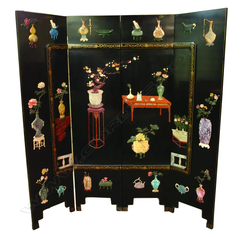 An exceptional Chinese black lacquer coloured stone and wood four panel standing screen entirely decorated in relief in various coloured stones and marbles with various precious objects Image 1++
