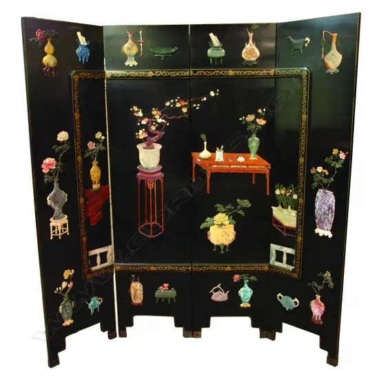 An exceptional Chinese black lacquer coloured stone and wood four panel standing screen entirely decorated in relief in various coloured stones and marbles with various precious objects