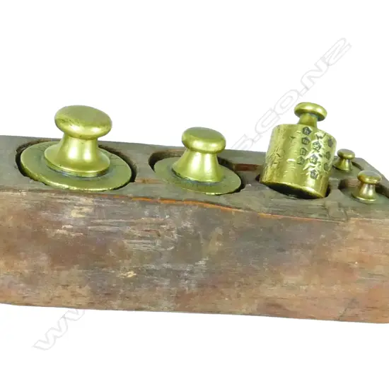 A set of antique French brass weights