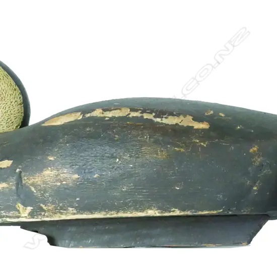 A vintage carved solid wood 18" duck decoy