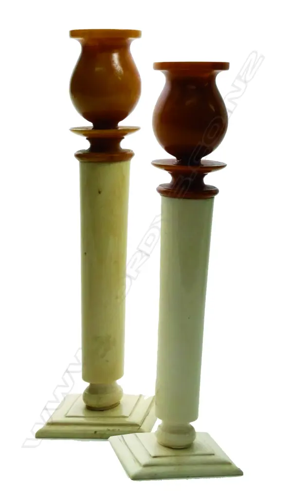 A pair of early 20thC ivory and Bakelite column candlesticks Image 1++