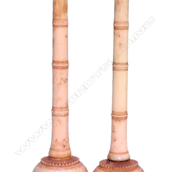 A pair of 19thC Indian ivory rosewater sprinklers