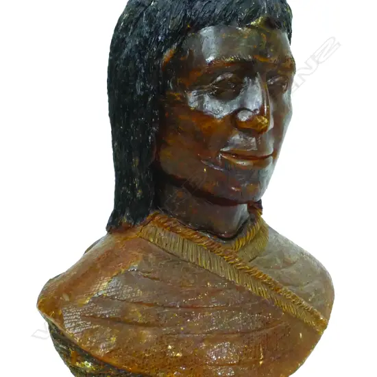 A large and rare N.Z. colonial kauri gum portrait bust of a Maori wahine