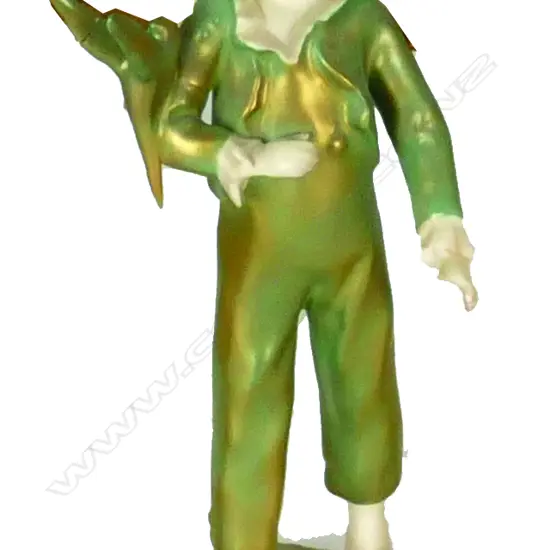 A small green Royal Worcester figurine