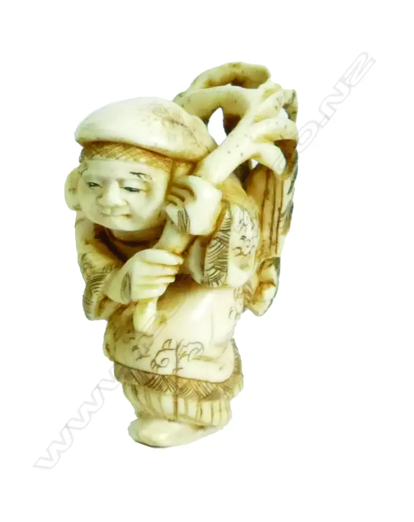 A Meiji period Japanese carved ivory Okimono Image 1++