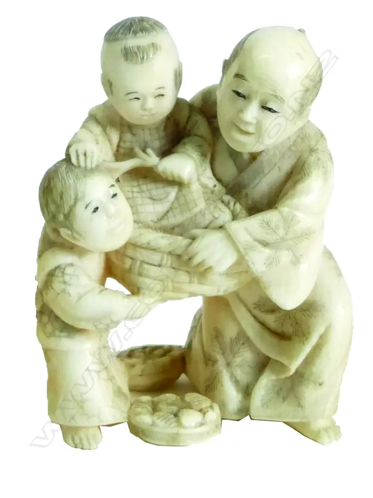 A Meiji period Japanese carved ivory Okimono Image 1++