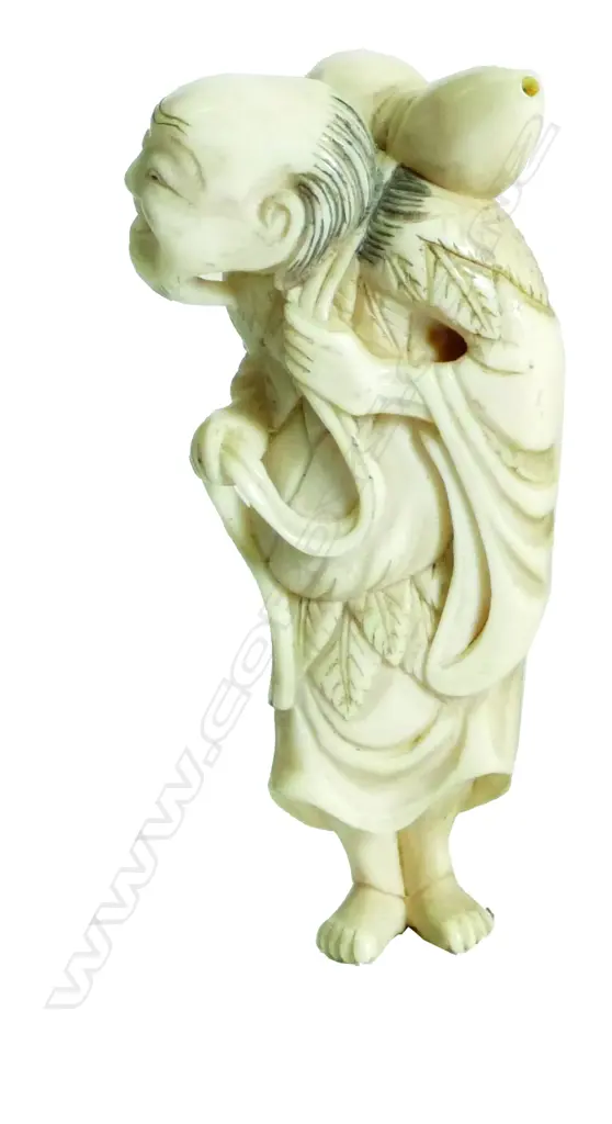 An old Japanese carved ivory netsuke of an old farmer Image 1++