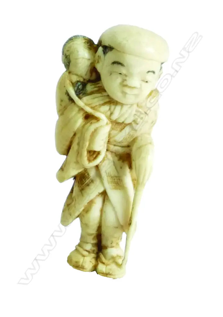 An old Japanese carved ivory Okimono Image 1++