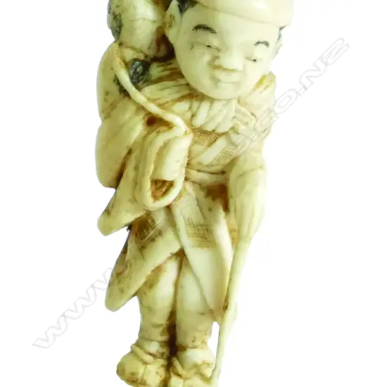 An old Japanese carved ivory Okimono