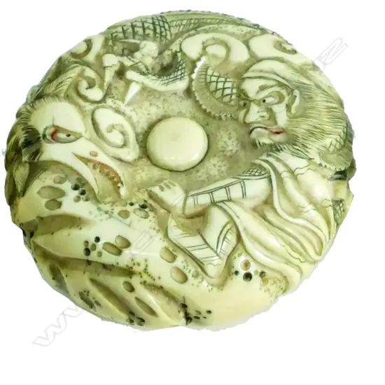An old Japanese carved ivory Manju netsuke