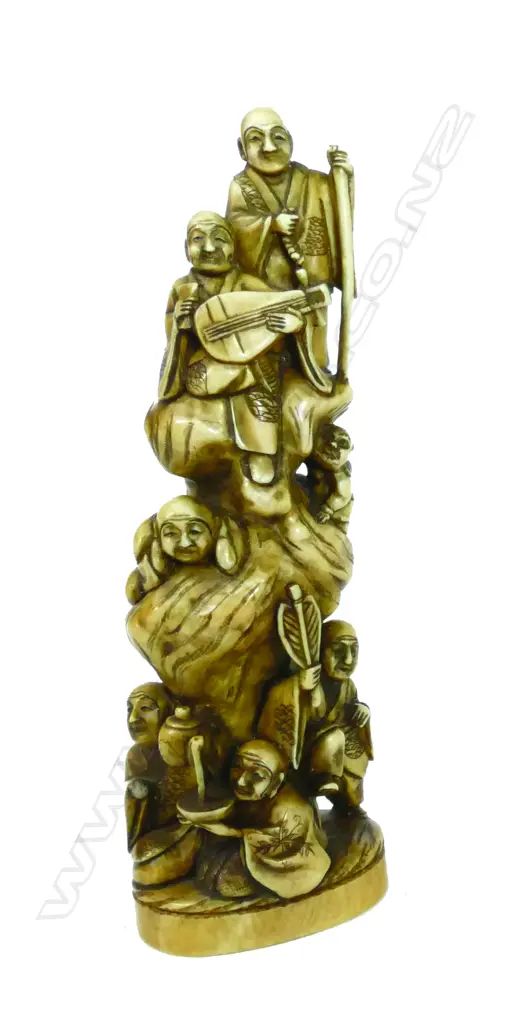 An Oriental carved ivory tusk end section Image 1++