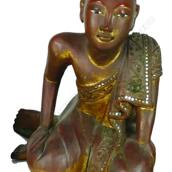 A Thai carved wood Buddhist figure of a kneeling monk