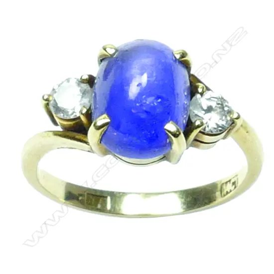 A 14ct. gold star sapphire and diamond ring