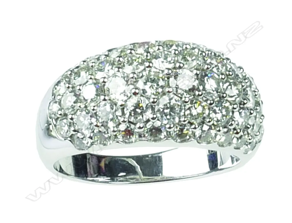 A good modern 18ct. white gold and multi-diamond lady's dress ring Image 1++