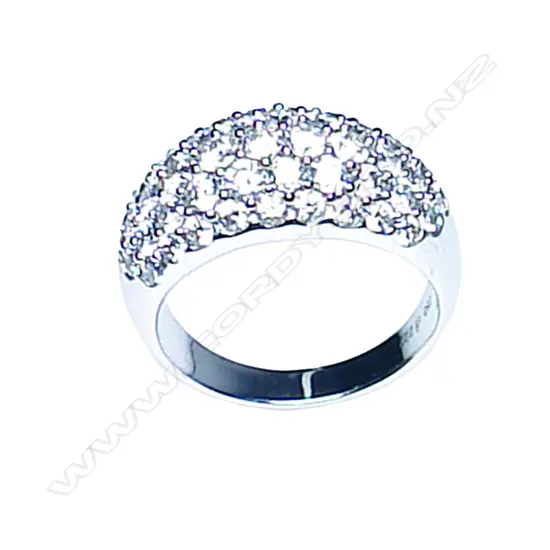 A good modern 18ct. white gold and multi-diamond lady's dress ring