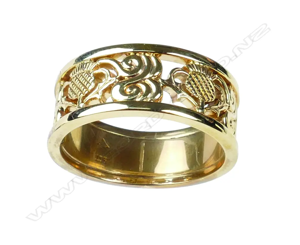 A modern 9ct. yellow gold custom made gent's wedding band Image 1++