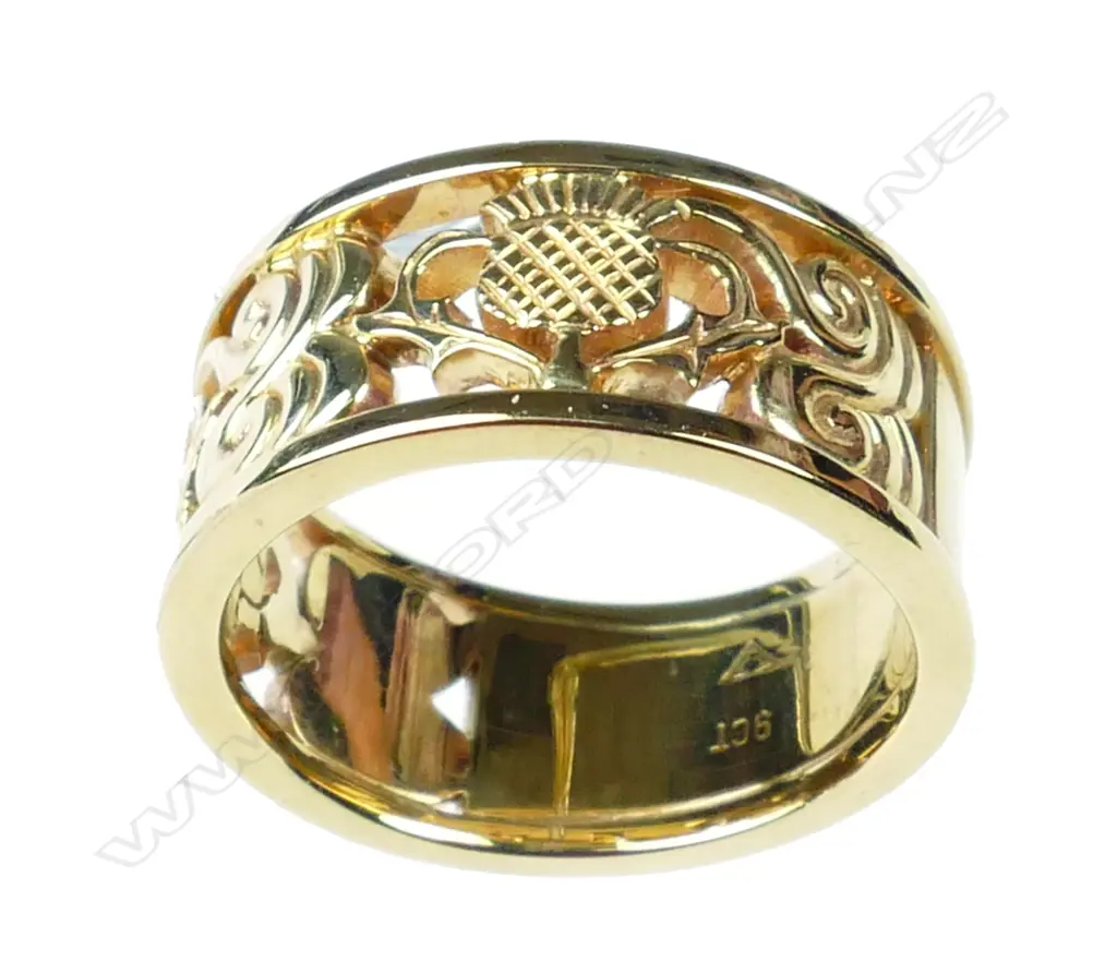 A modern 9ct. yellow gold custom made lady's wedding band Image 1++