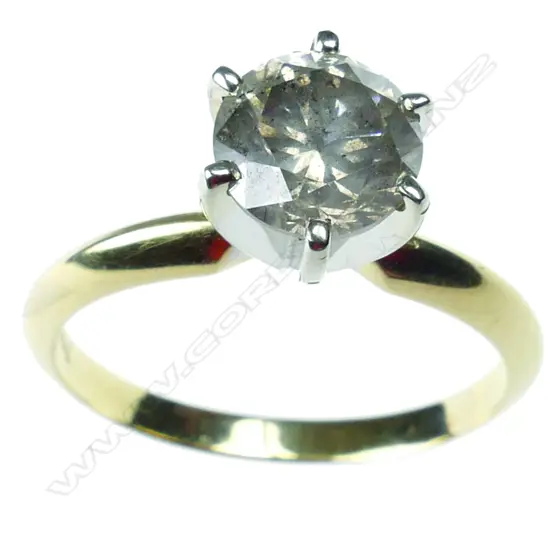 A 14ct. gold and diamond solitaire ring