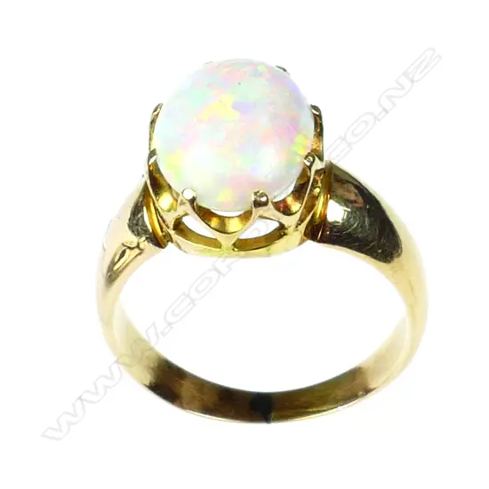 A vintage 18ct. yellow gold and opal dress ring