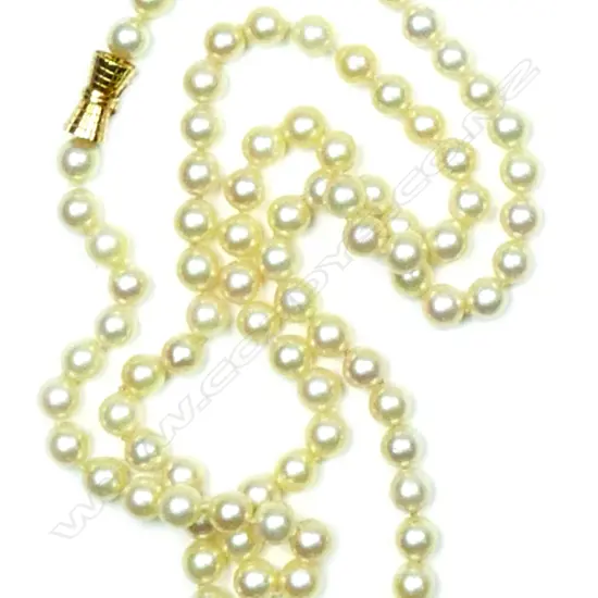 A long good cultured pearl necklace