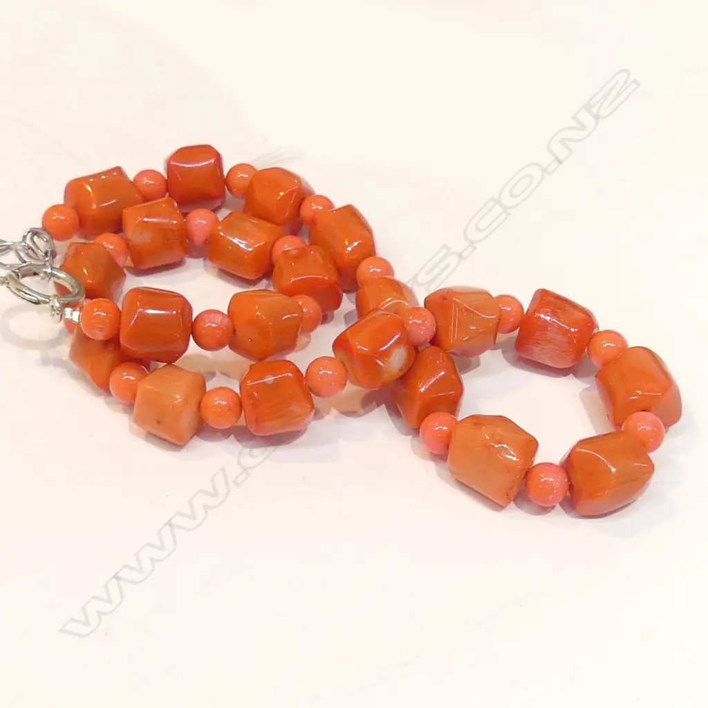 A coral rounded cube form bead necklace Image 1++