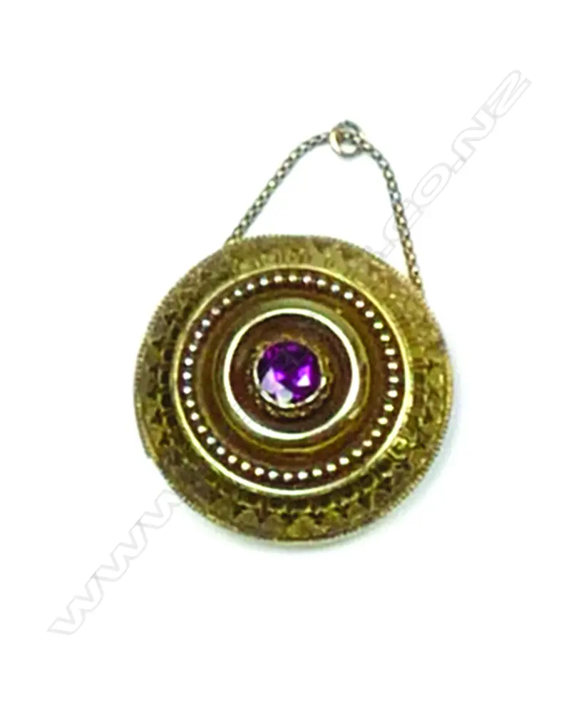 A Victorian Etruscan 15ct. yellow gold target brooch Image 1++